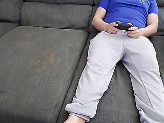 Stepsister sucks stepbrother together with eats his sperm while he plays video games